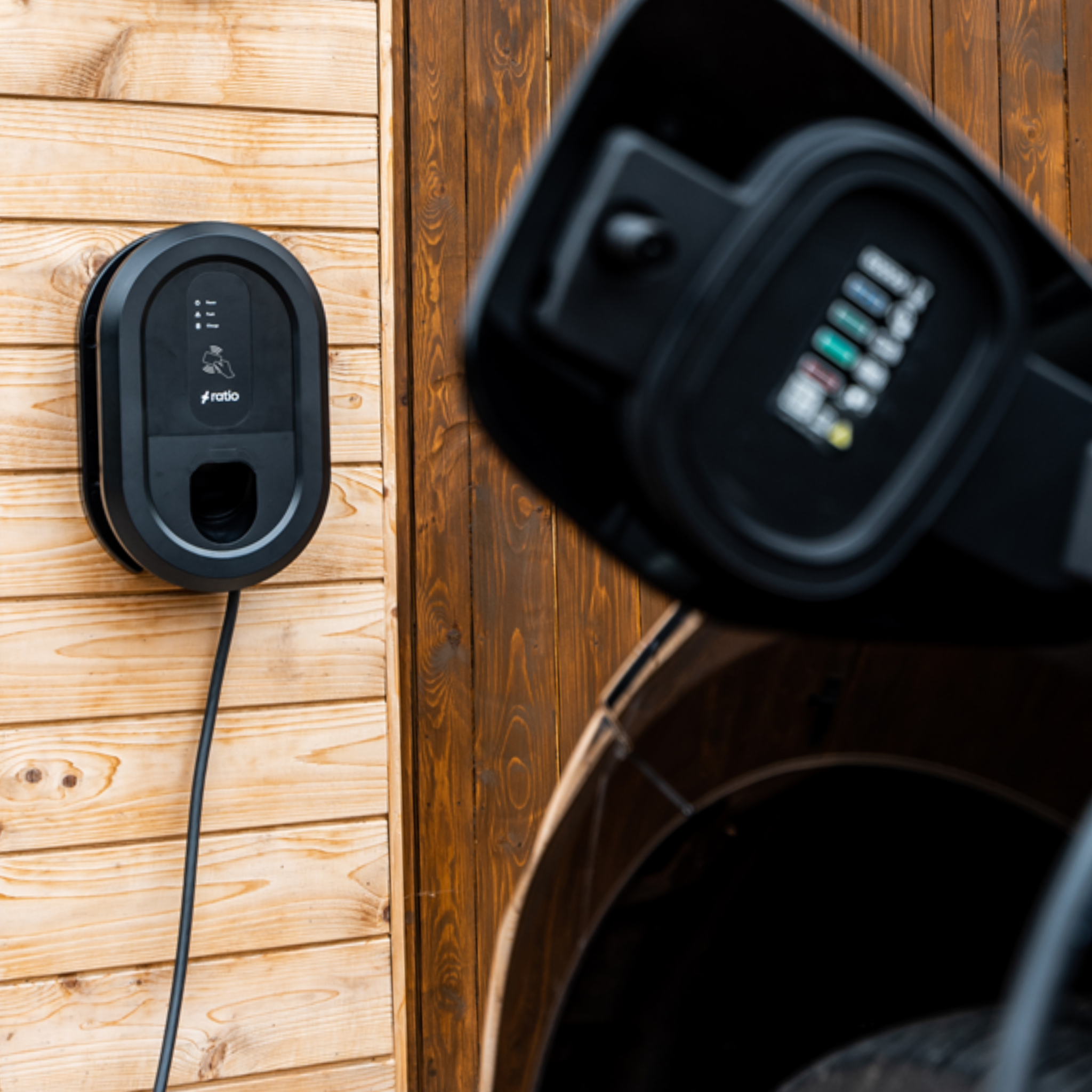 Electric car connected to a Ratio Solar EV charger with fixed charging cable